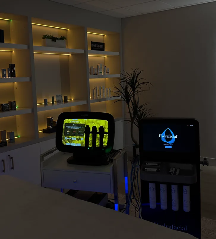 Ella Skin treatment room with HydraFacial equipment and built-in product shelves